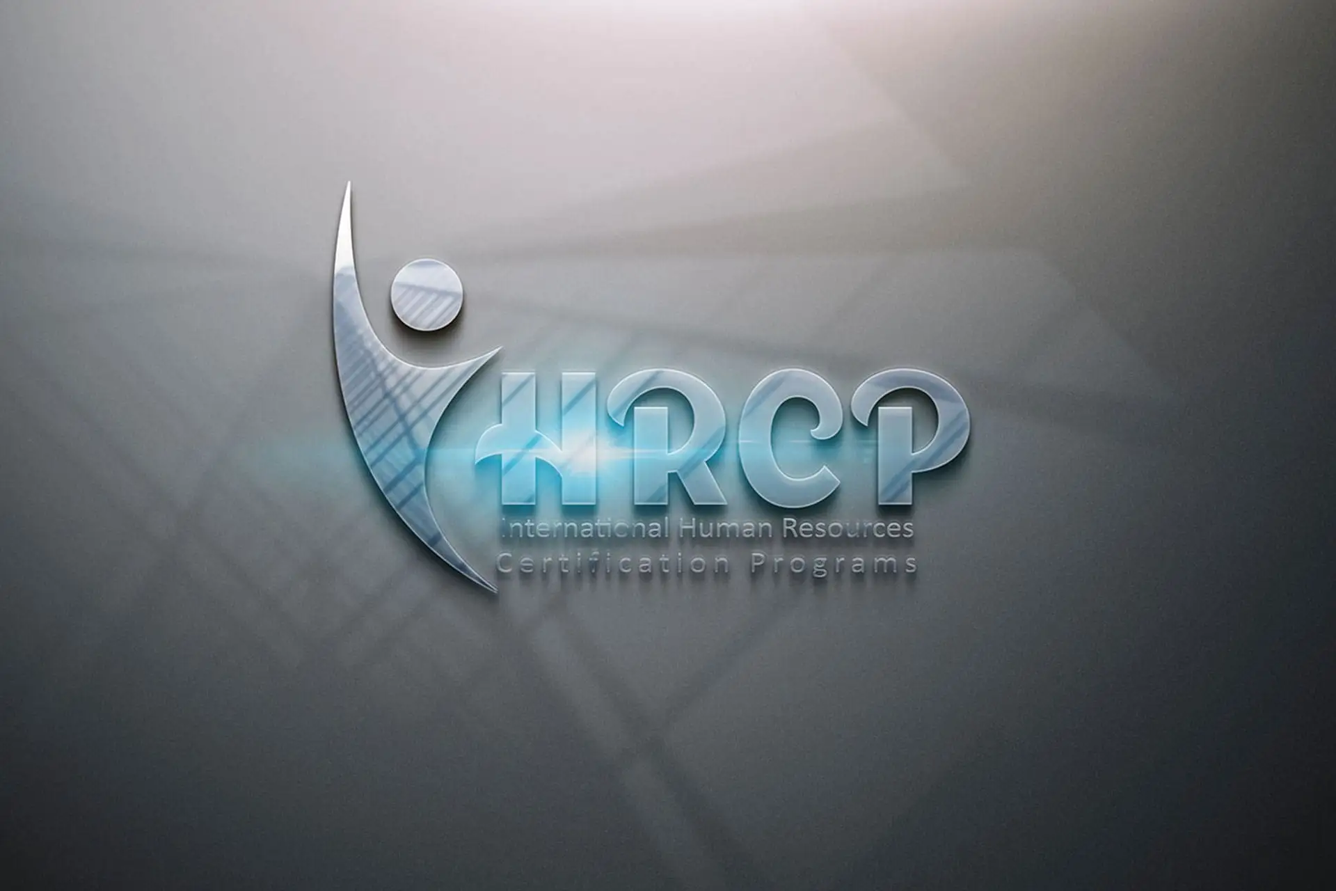 IHRCP International Human Resources Certification Programs 3D Logo: A modern, metallic logo with a stylized human figure icon and the acronym "IHRCP," rendered in shiny chrome and bright blue lighting on a dark gray background. The 3D design emphasizes professional human resources training, certification programs, and corporate education services.